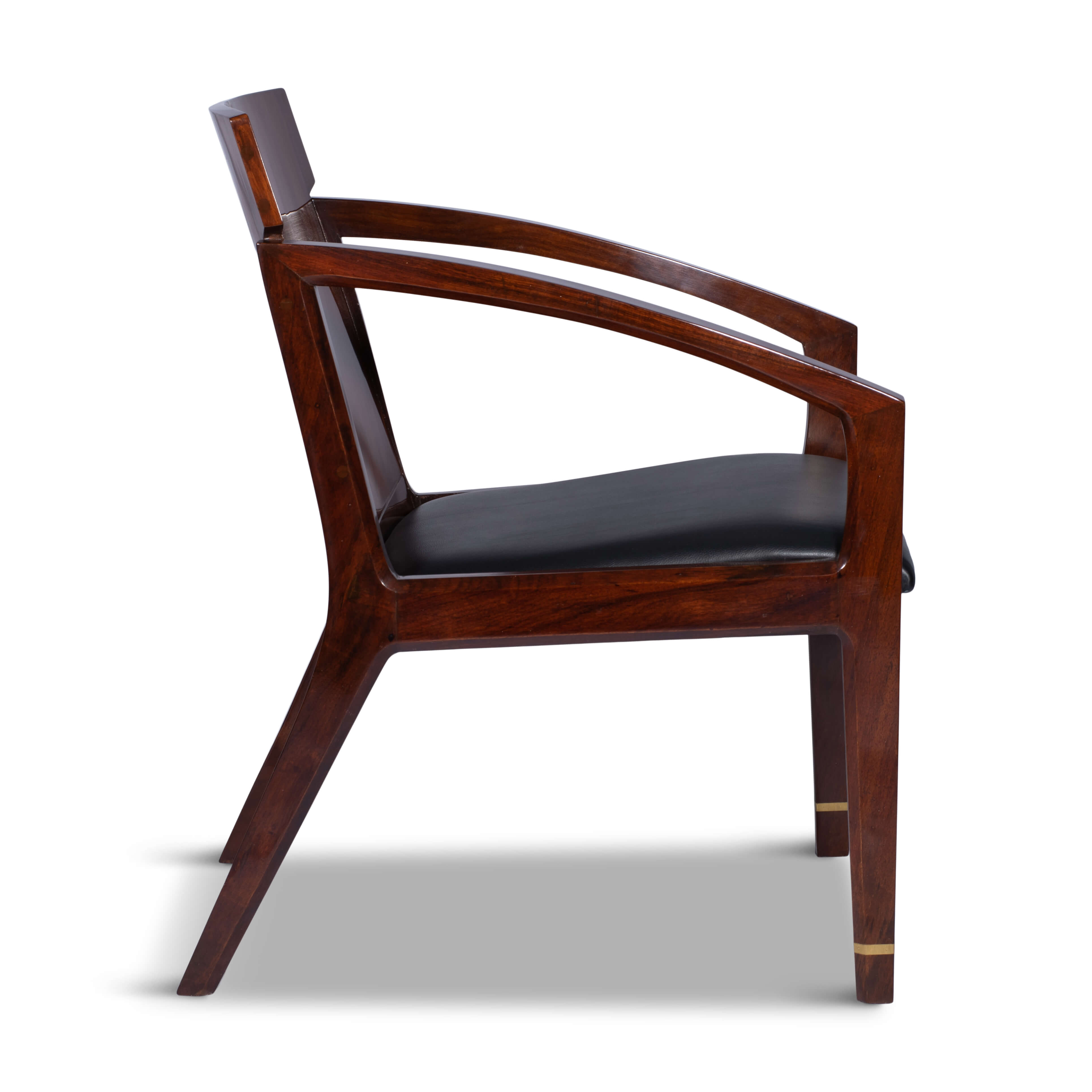 Hand-carved rosewood armchair with plush upholstered seat on white background