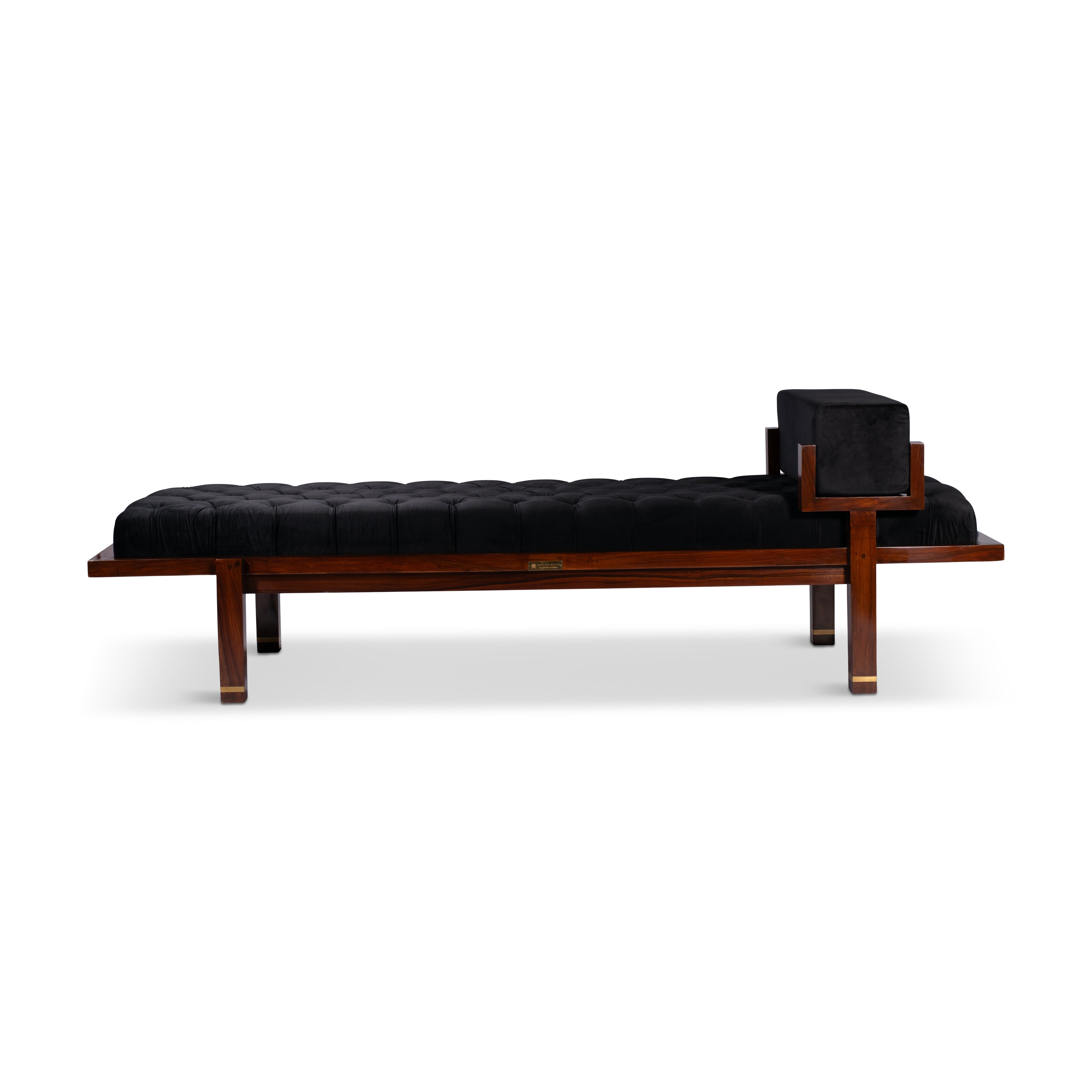 Back view of the CETI lounge daybed showcasing the rosewood frame’s clean lines and the tufted leather cushion’s rear profile