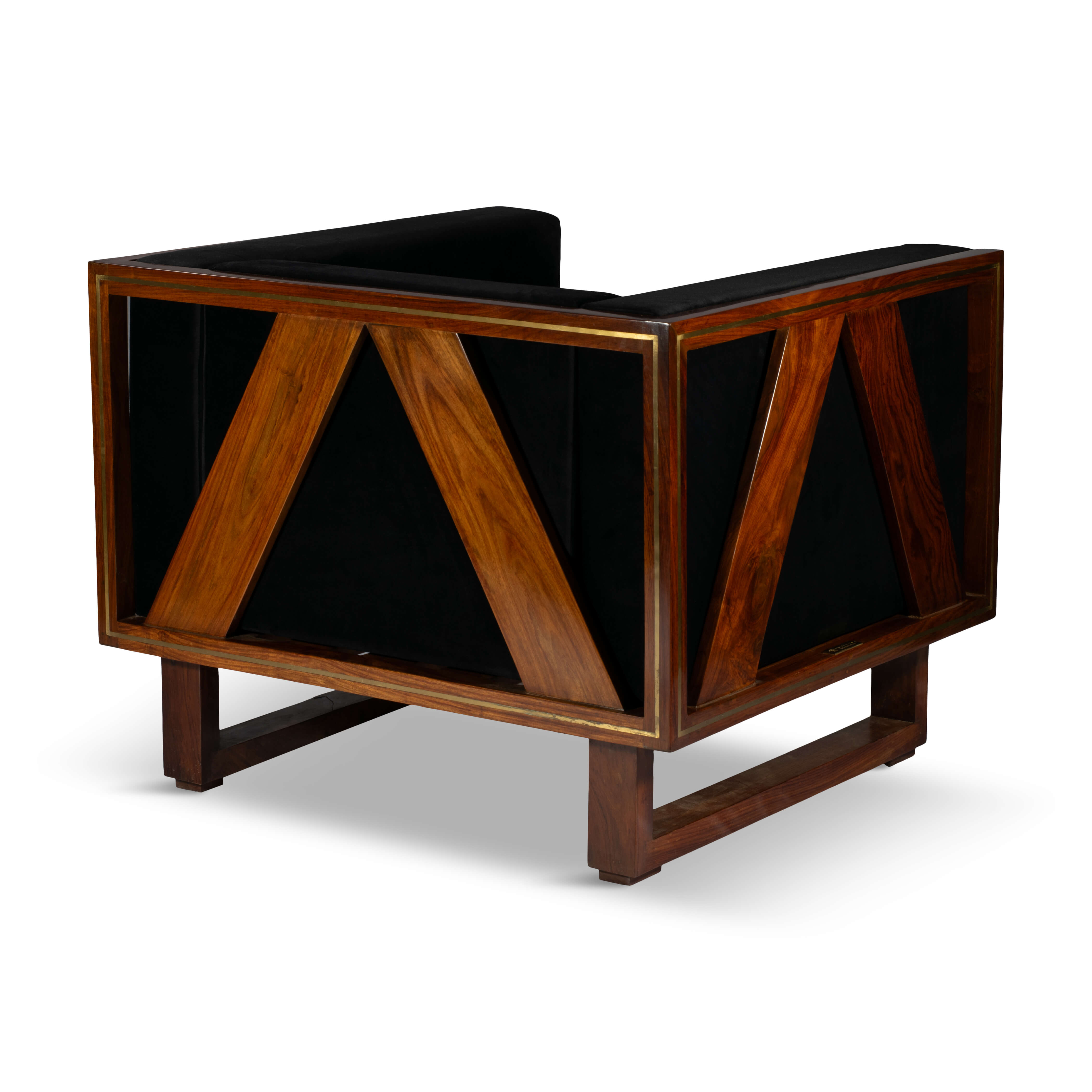 Rear view of the accent chair showing its geometric rosewood pattern and solid frame