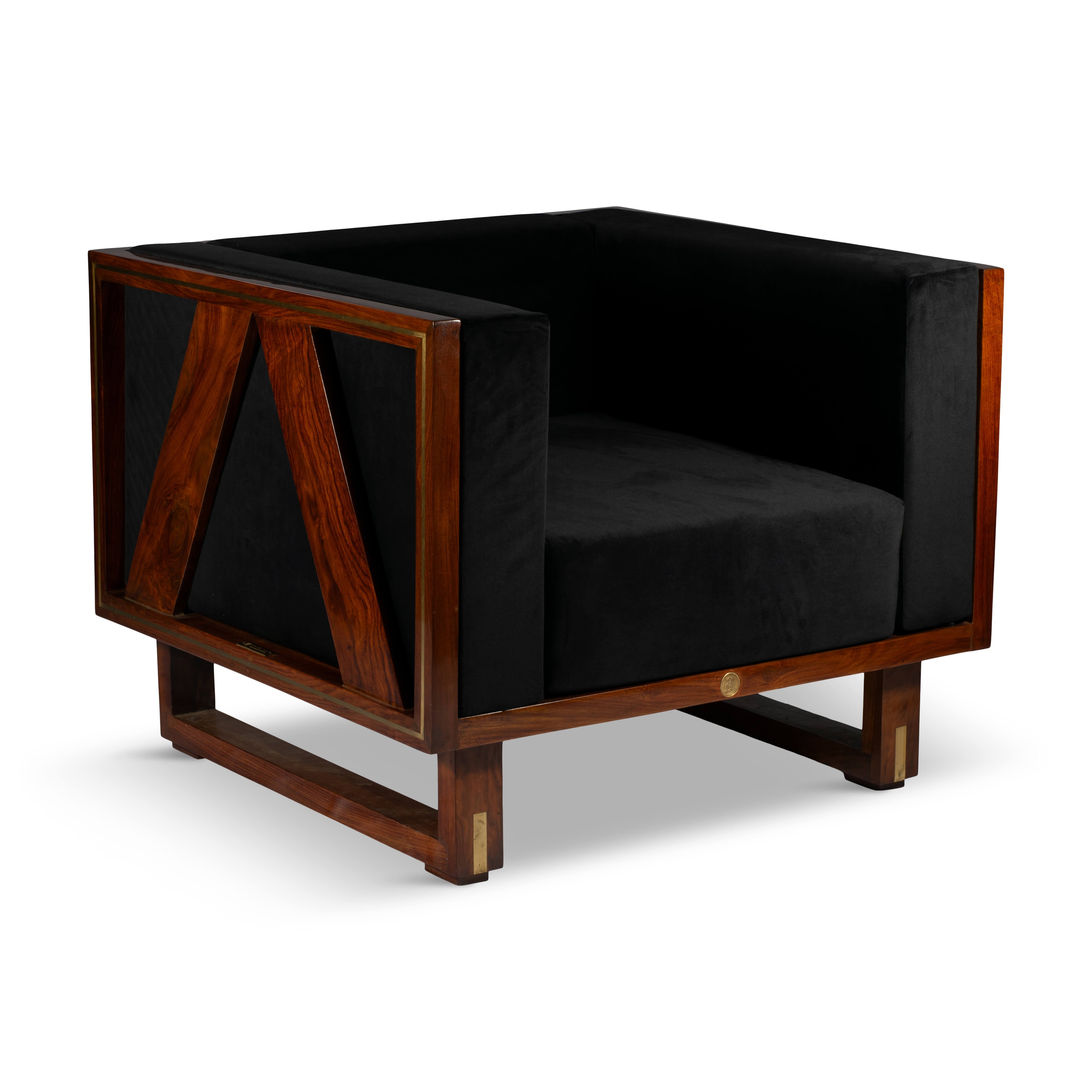 Reverse angled shot of the rosewood frame’s triangular inlay design with velvet upholstery