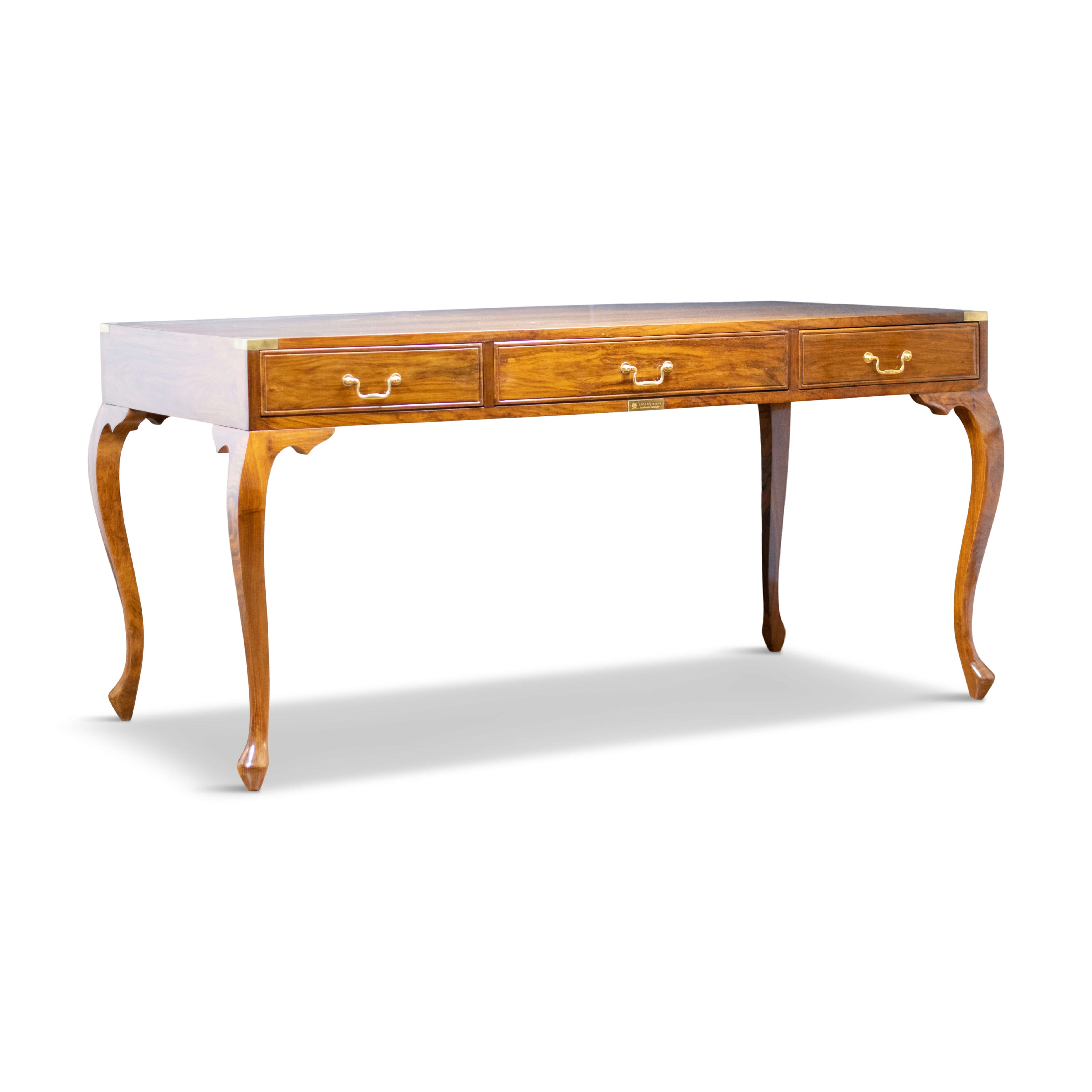 Irish Regency–style writing table with polished brass inlays on white backdrop