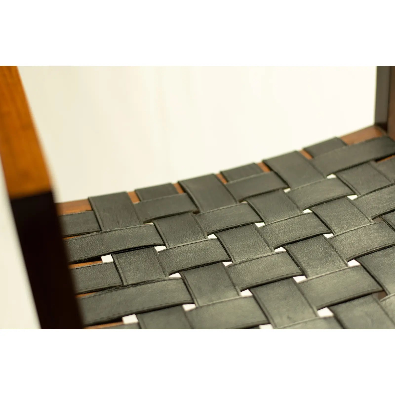 Close-up of the leather straped seat base