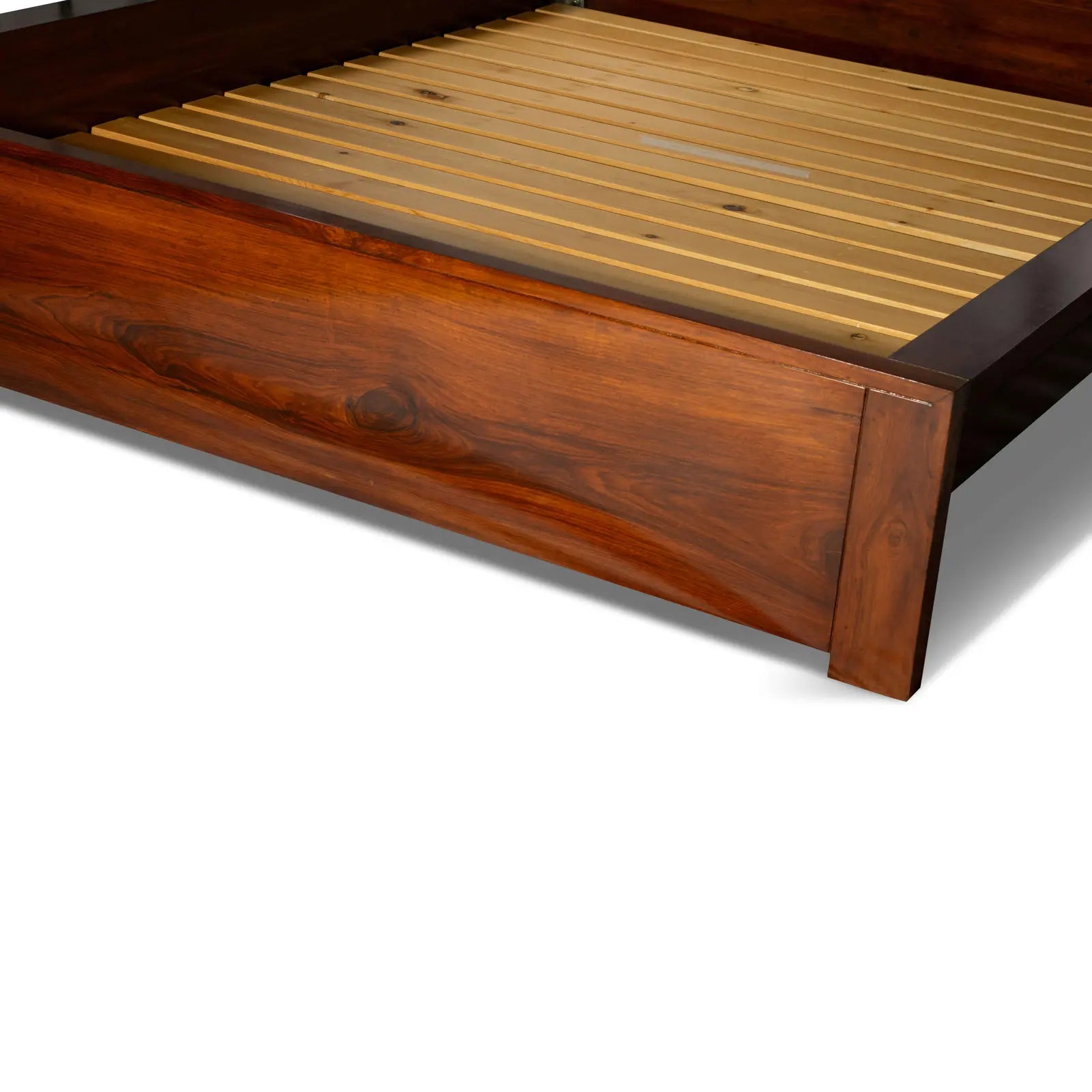 Solid wood bed front profile view highlighting robust rosewood frame construction