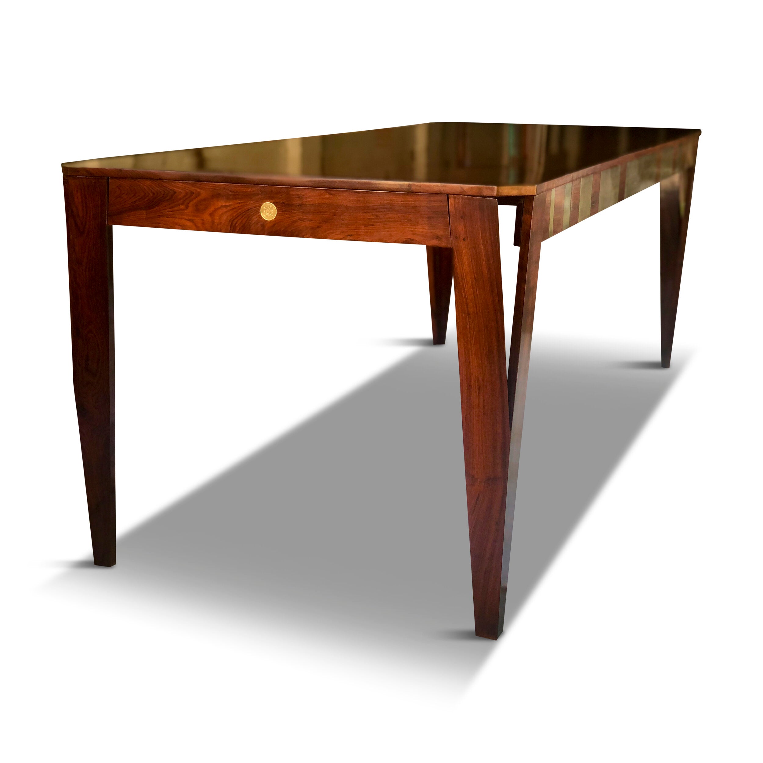 Handmade AVA solid wood dining table with tapered legs and rich woodgrain finish on white backdrop